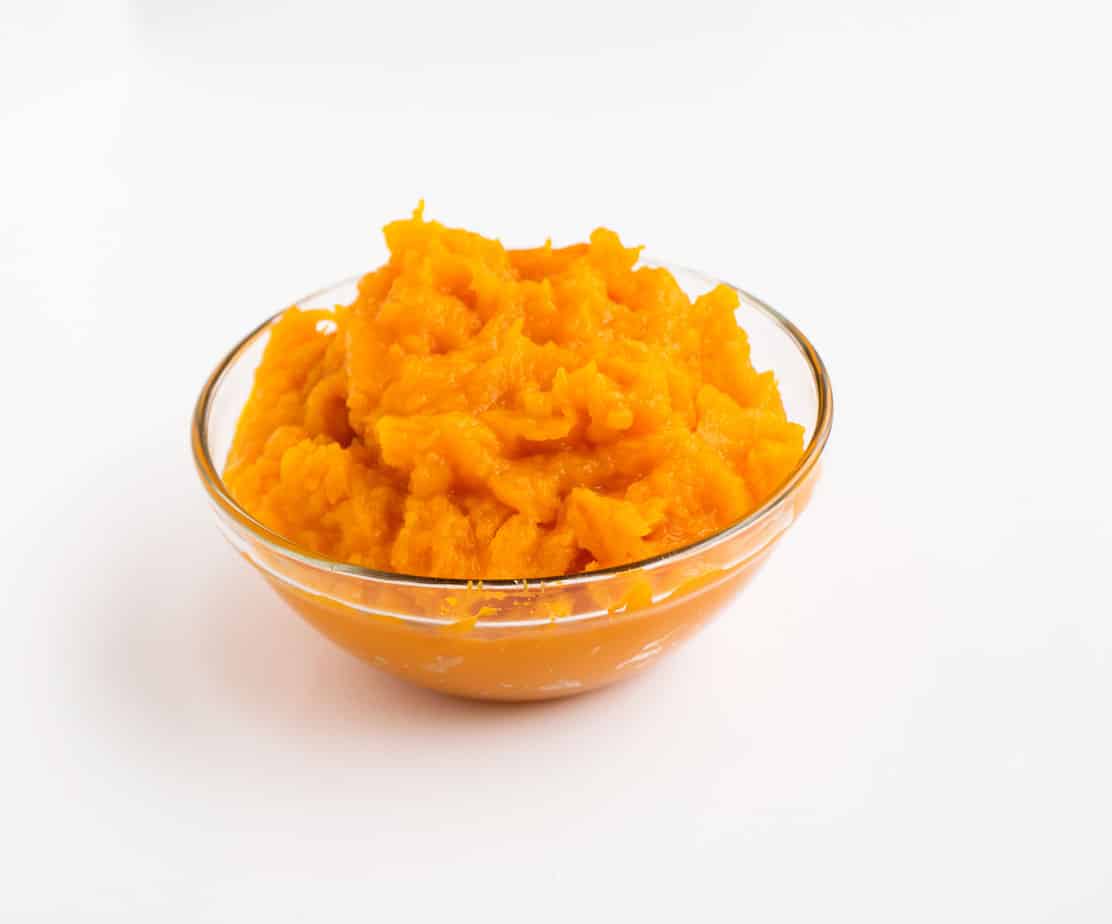 Easy Homemade Pumpkin Puree in a glass serving dish.