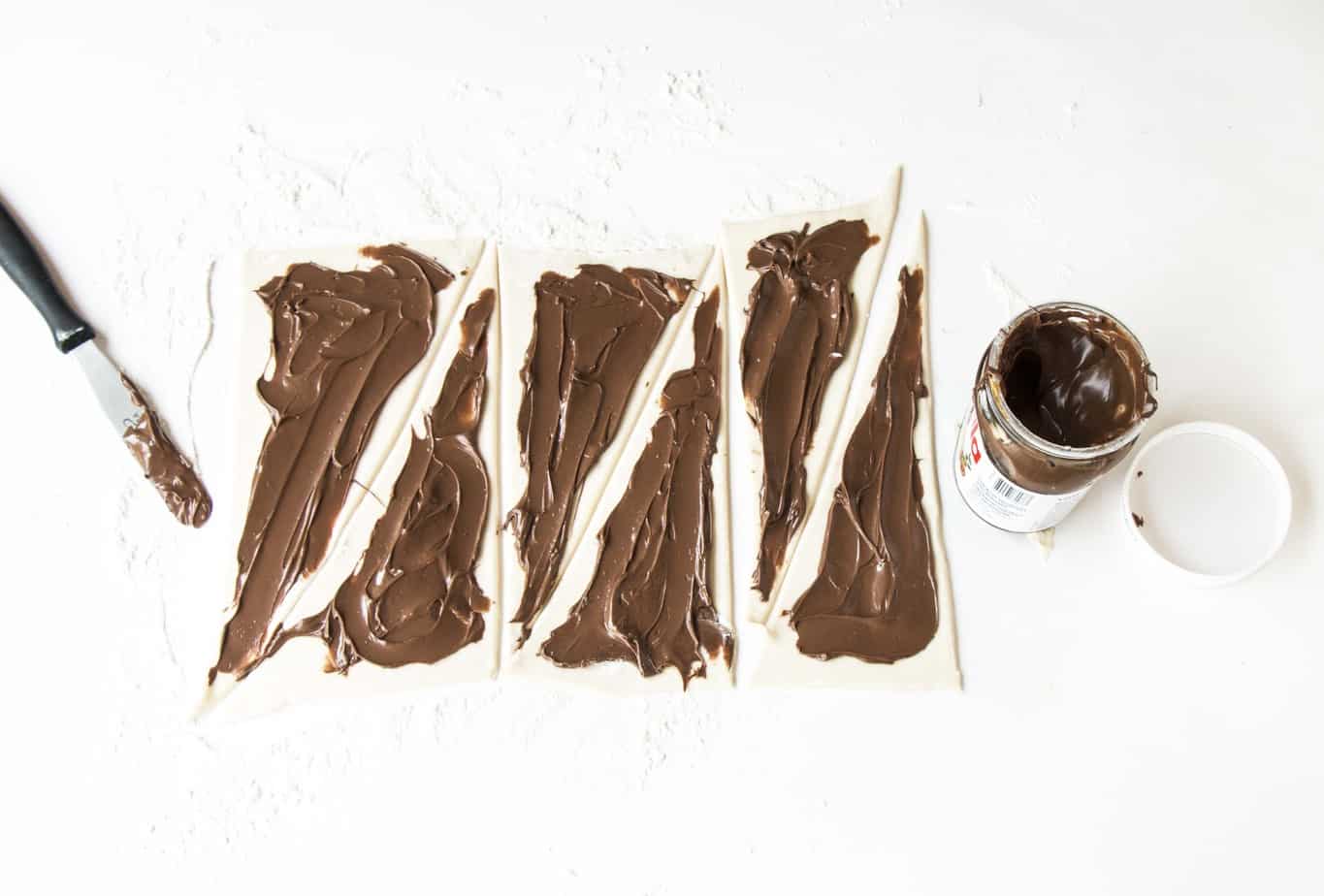 Pastry triangles spread with Nutella