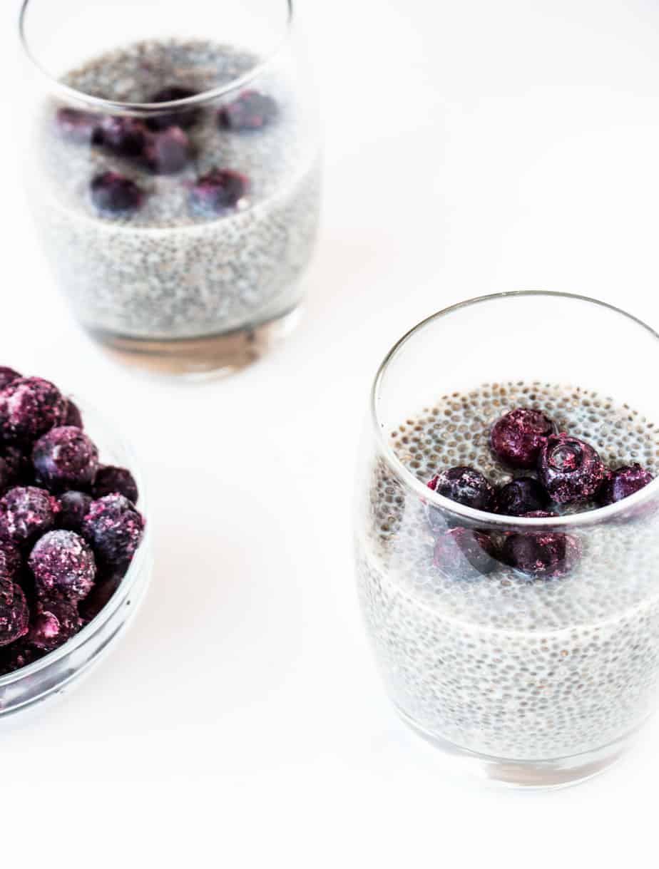 Vanilla Blueberry Chia Puddings topped with blueberries.