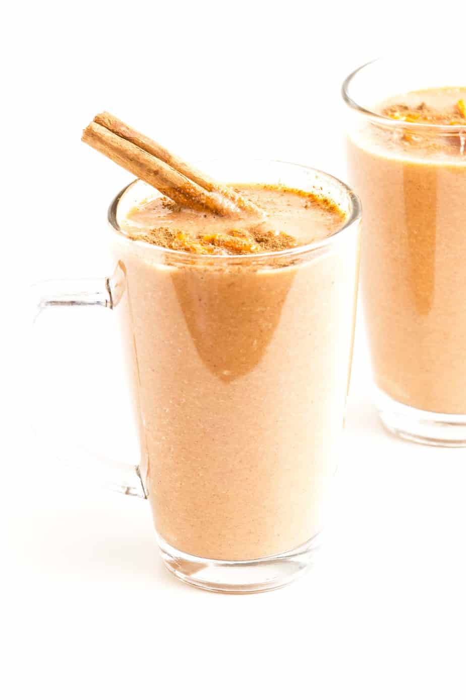 Healthy Carrot Cake Smoothie with a cinnamon quill.