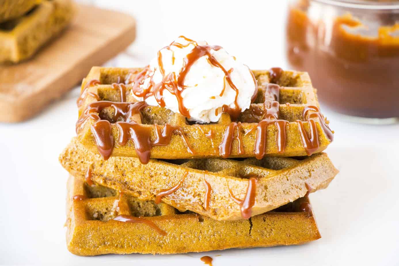 Healthy Pumpkin Waffles topped with Salted Caramel and whipped cream
