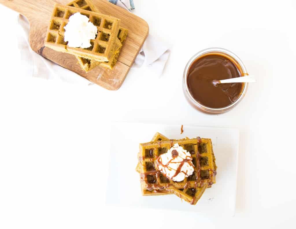 Healthy Pumpkin Waffles topped with Salted Caramel and whipped cream