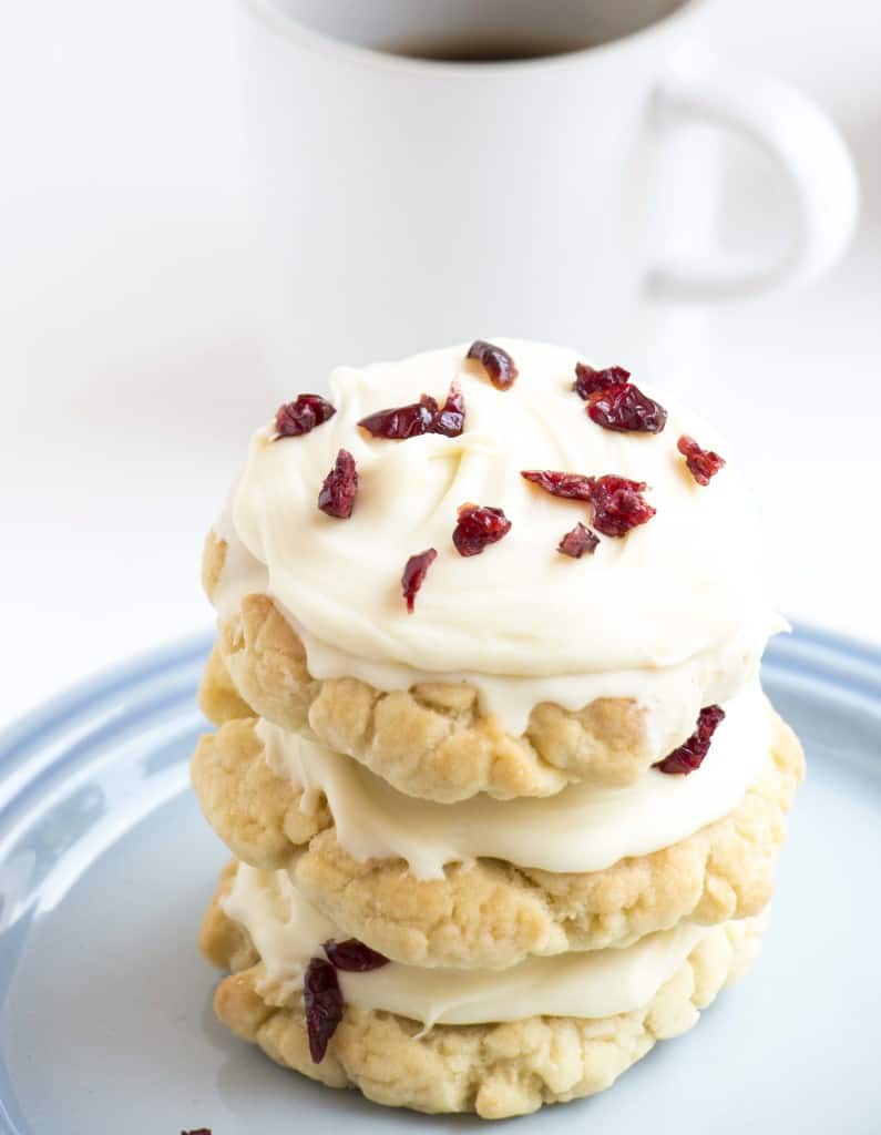 A stack of cookies on a plate.