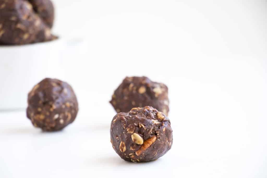 Nutty Chocolate Energy Balls. Vegan, gluten free, made with chia seeds, peanut butter and pecan nuts.