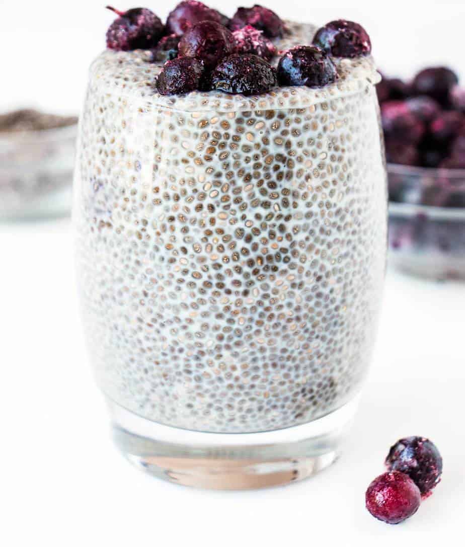 Delicious healthy Vanilla Blueberry Chia Pudding in a serving glass.