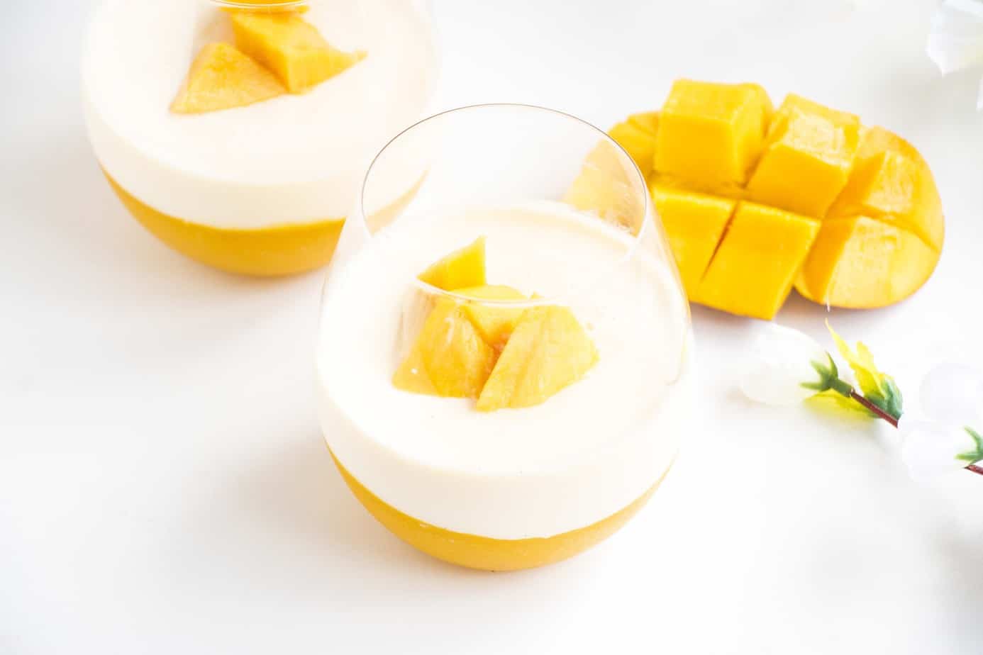 Refreshing Mango Panna cotta with fresh mango chunks.