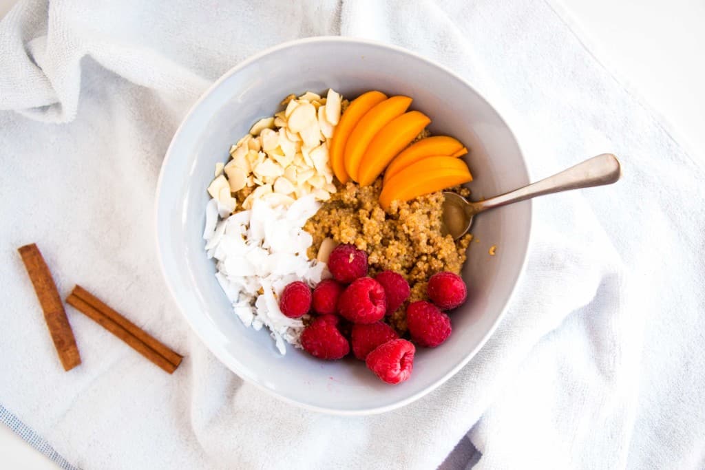 Cinnamon and Peach Quinoa Porridge - A delicious, extremely healthy breakfast packed with protein. The perfect way to start any day.