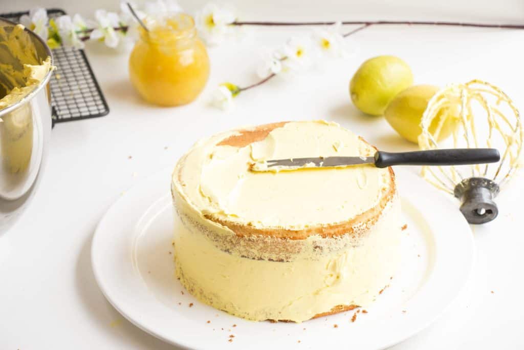 Zesty Lemon Cake with Lemon Italian Meringue Buttercream - The most lemony cake that you will ever taste, so delicious and easy to make and will wow any guests with its incredible lemon taste.