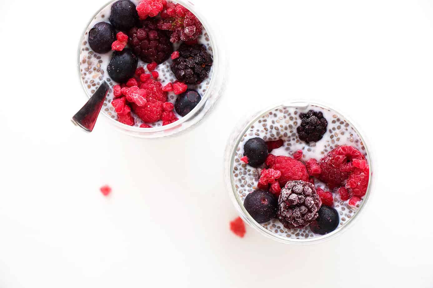 Chia pudding topped with frozen berries.