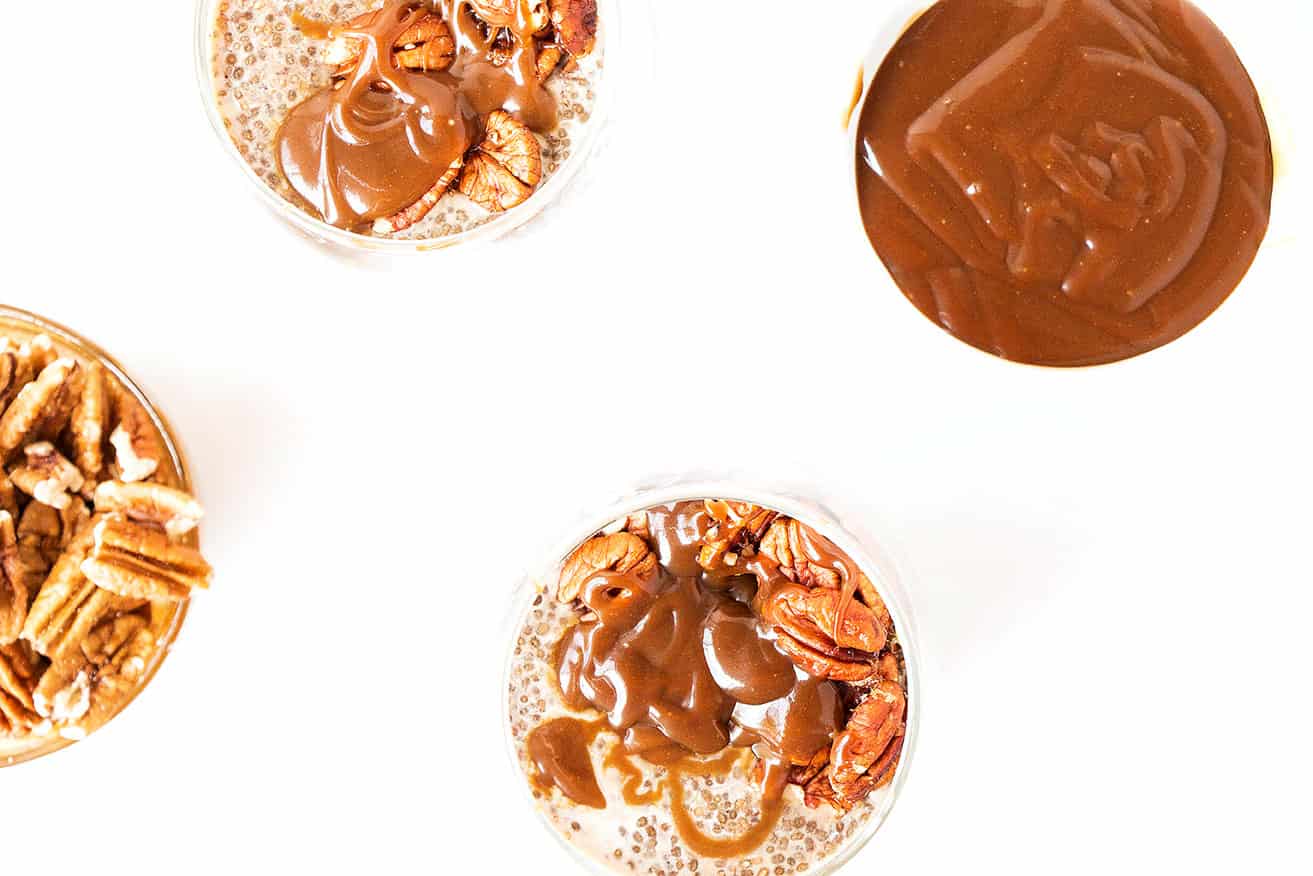 Salted caramel and pecans in serving bowls.