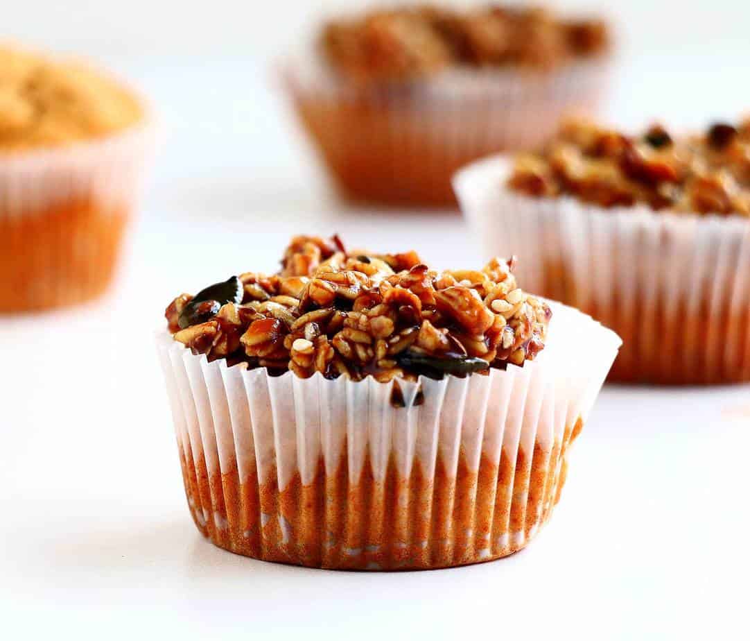 A muffin topped with granola.