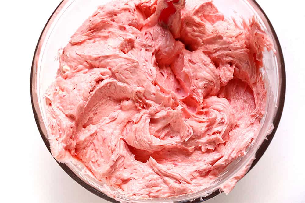 Easy Raspberry Buttercream - A delicious fresh buttercream that is perfect for any cake or cupcakes. Easy to make and creates a beautiful natural colour.