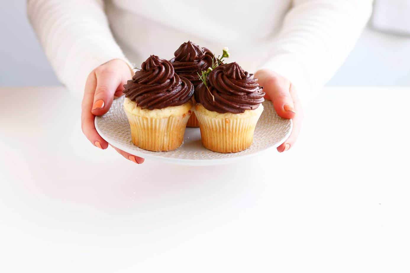 The ultimate go to cupcake recipe, these Easy Vanilla Cupcakes with Creamy Chocolate Frosting only take a few minutes to whip up and can be frozen for up to a few weeks! The only cupcake recipe you will ever need!