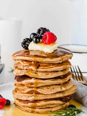 oat milk pancake stack with fresh berries
