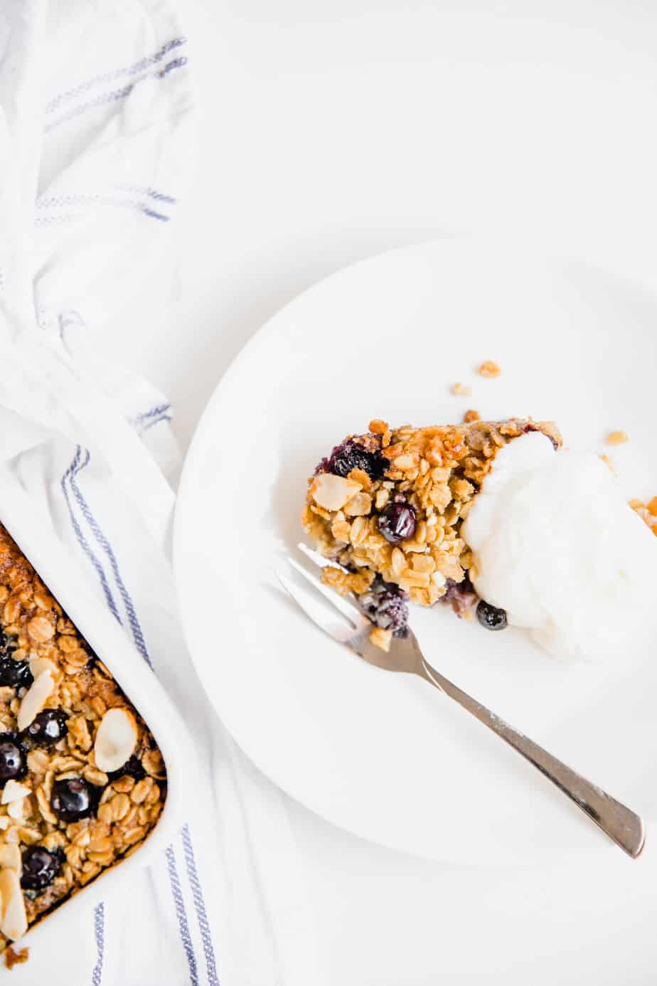 The Ultimate Blueberry Baked Oatmeal recipe! It's vegan, refined sugar-free, crunchy, chewy and simply all round yummy! 