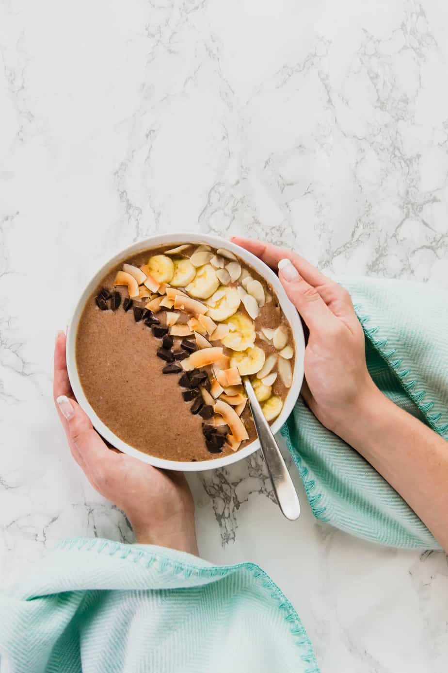 This Almond Butter Smoothie Bowl is the ultimate healthy indulgence, made with delicious almond butter, bananas and a few other delicious things, it will be your new favourite go-to recipe for a healthy vegan treat or meal.