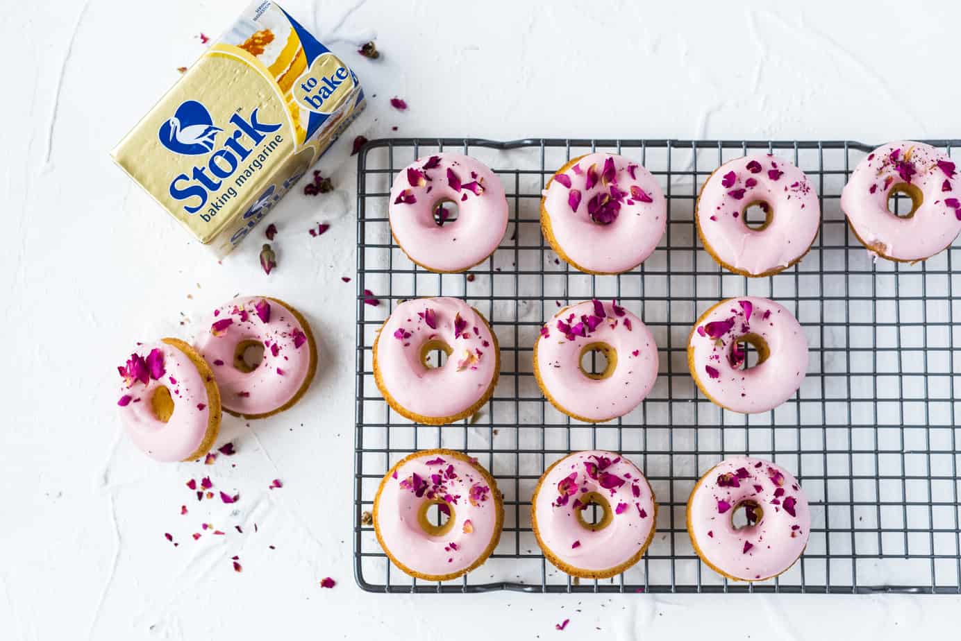 Donuts and champagne all rolled into one? Yes, please! These pretty little baked donuts are perfect for any occasion and are so incredibly easy to make. Made with Stork Bake, they are sure to taste even better than they look and come out perfectly every single time!