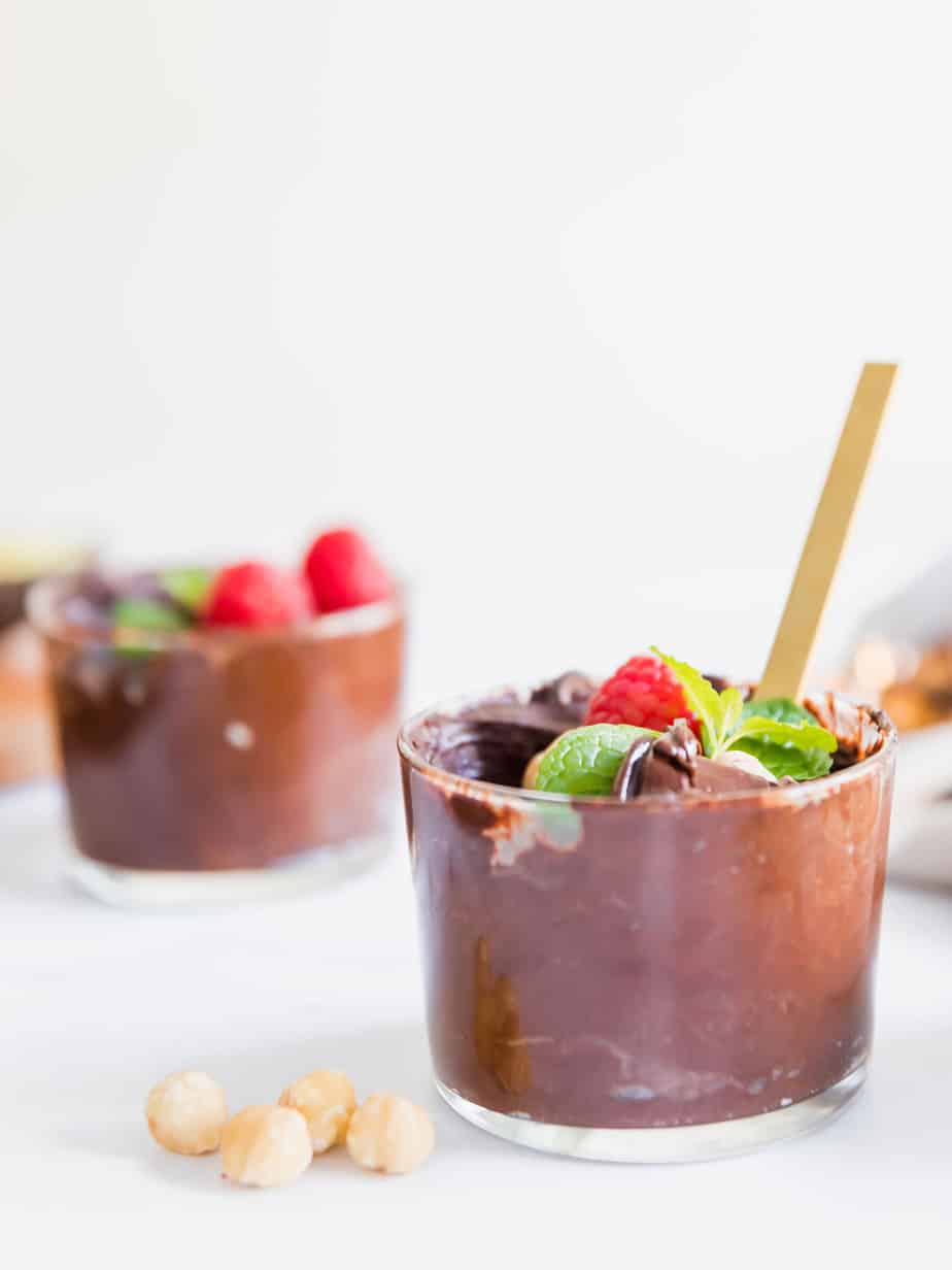 Creamy Avocado Chocolate Mousse with dark chocolate and fresh berries.