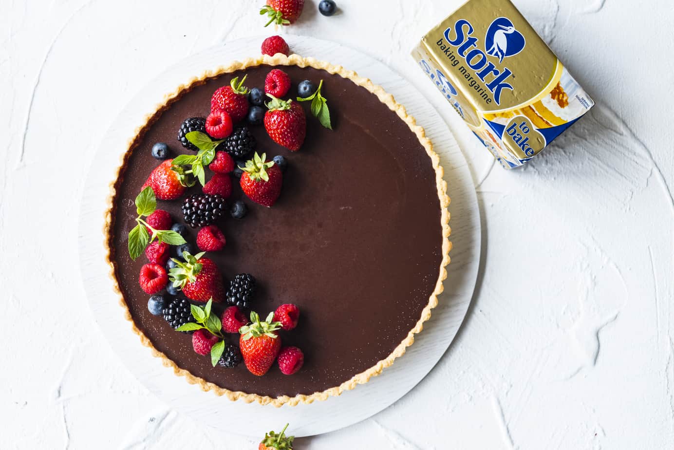 When you need a decadent yet easy dessert this Easy Chocolate Ganache Tart will become your ultimate go-to recipe. Made with dark chocolate, Stork Bake and topped with fresh berries.