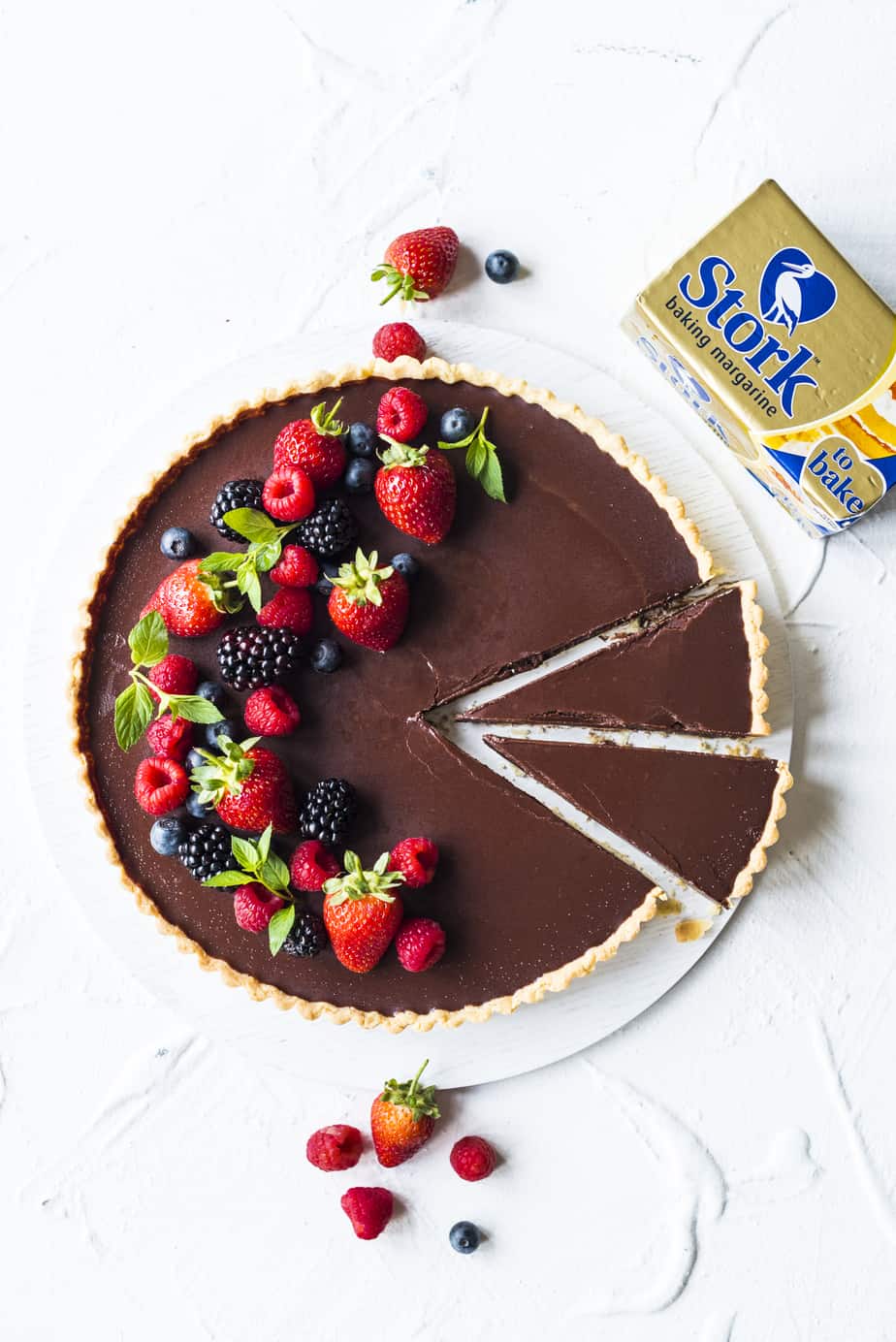 When you need a decadent yet easy dessert this Easy Chocolate Ganache Tart will become your ultimate go-to recipe. Made with dark chocolate, Stork Bake and topped with fresh berries.