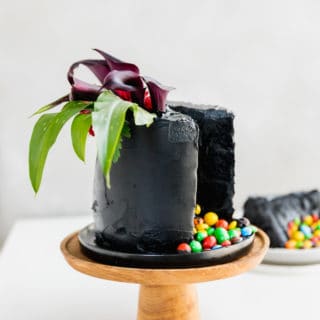 Layers of velvety black, moist cake, covered in the softest black frosting and of course filled with my favourite Skittles & M&M's! This is the ultimate Halloween cake, with a classy twist of course!