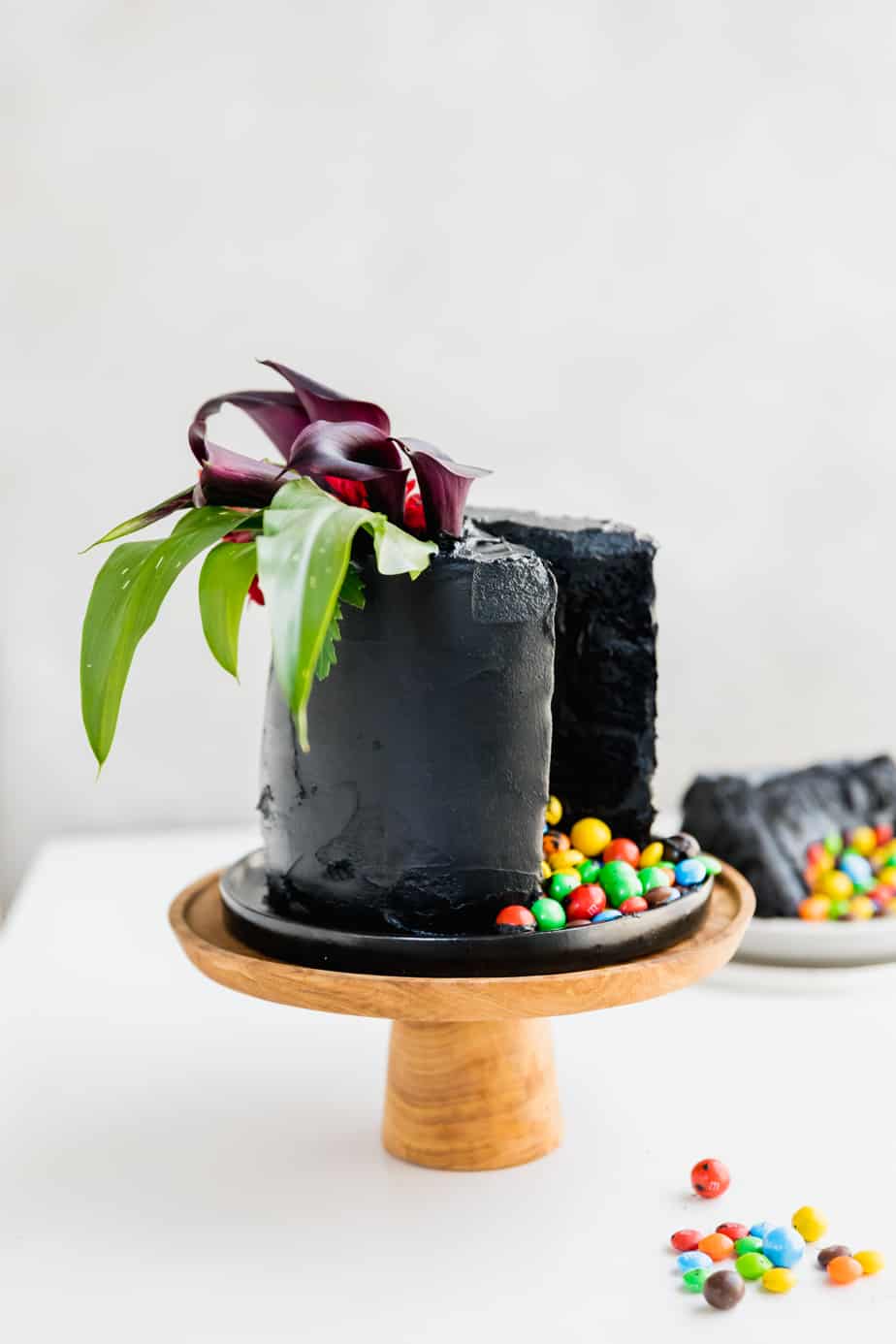 Layers of velvety black, moist cake, covered in the softest black frosting and of course filled with my favourite Skittles & M&M's! This is the ultimate Halloween cake, with a classy twist of course!