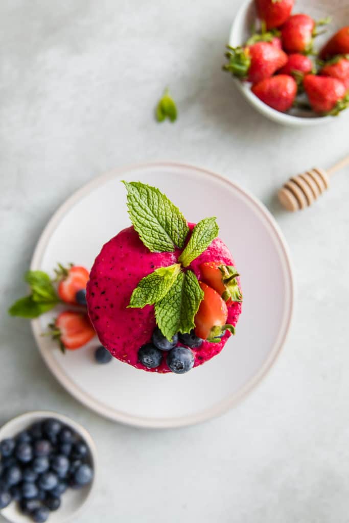 A Strawberry Beetroot Detox Smoothie with fresh mint and berries.