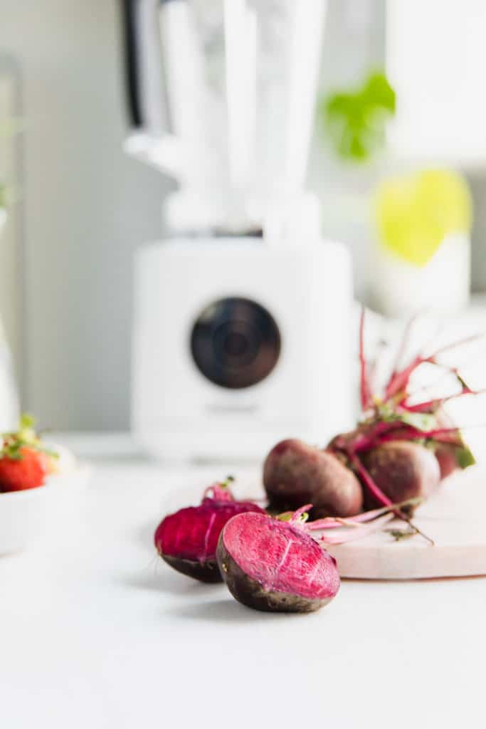 A bunch of beetroots on marble.