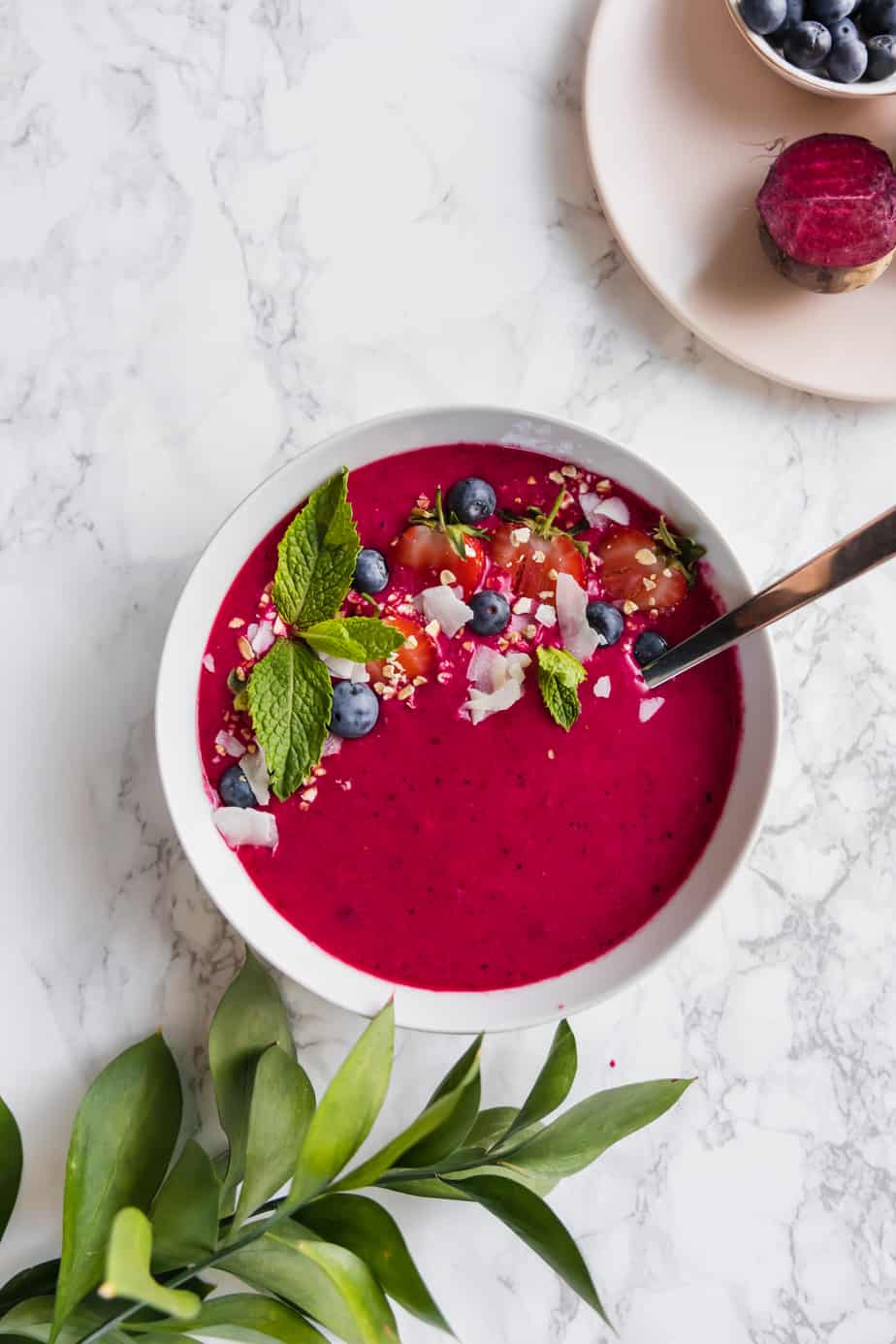 This Healthy Beet Berry Smoothie Bowl is the only breakfast recipe you'll ever need. Quick, vegan, gluten-free and delicious.