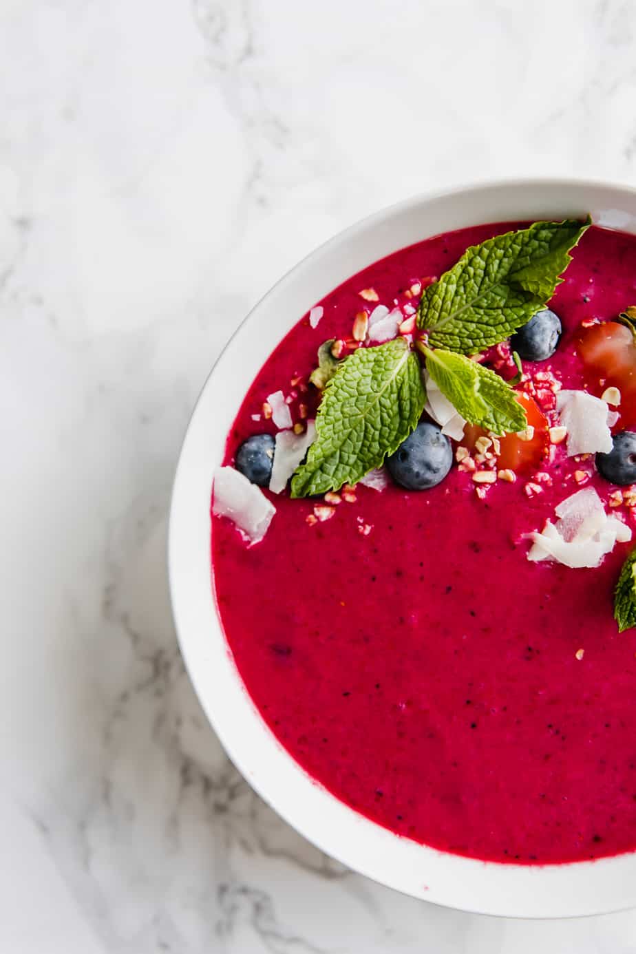 This Healthy Beet Berry Smoothie Bowl is the only breakfast recipe you'll ever need. Quick, vegan, gluten-free and delicious.