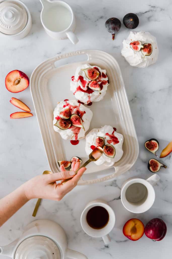 This Fig & Thyme Pavlova with Spicy Red Wine Plum Syrup is the only dessert recipe you'll ever need. Elegant, fruity and just a touch of spice. Perfect for any season.