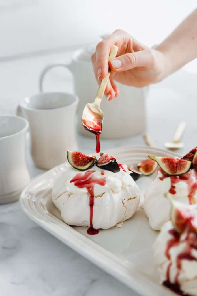 This Fig & Thyme Pavlova with Spicy Red Wine Plum Syrup is the only dessert recipe you'll ever need. Elegant, fruity and just a touch of spice. Perfect for any season.