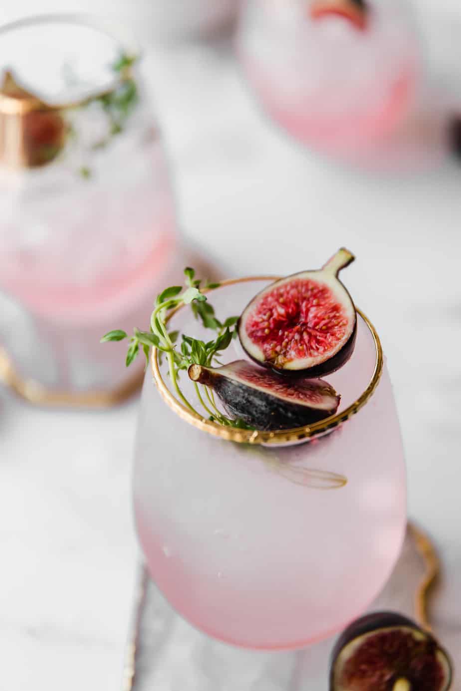 An Empress Gin Cocktail with fresh figs and thyme.