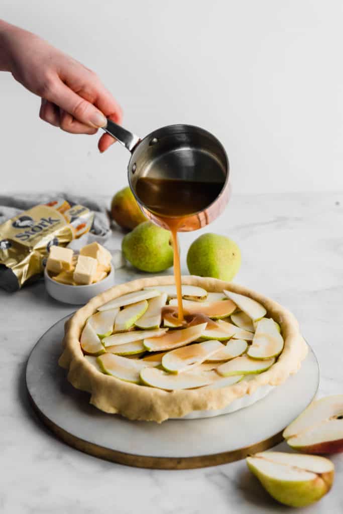 With it's sweet and salty pear filling, crispy all-butter crust and caramel sauce, this Pear and Salted Caramel Pie is the only pie recipe you'll ever need.