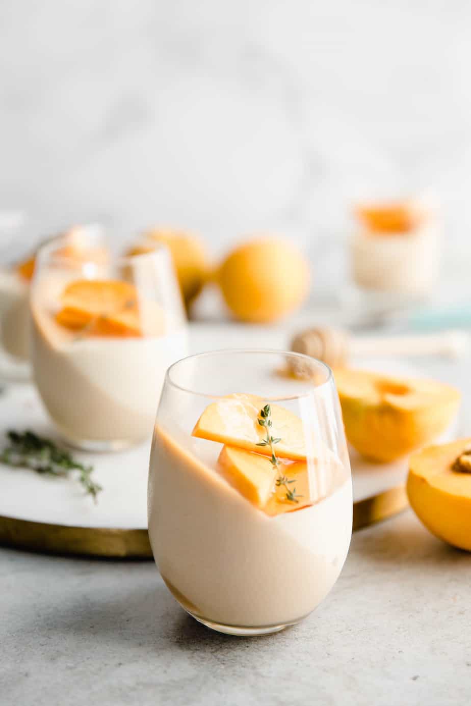 Rooibos & Vanilla Panna Cotta with peaches and thyme.