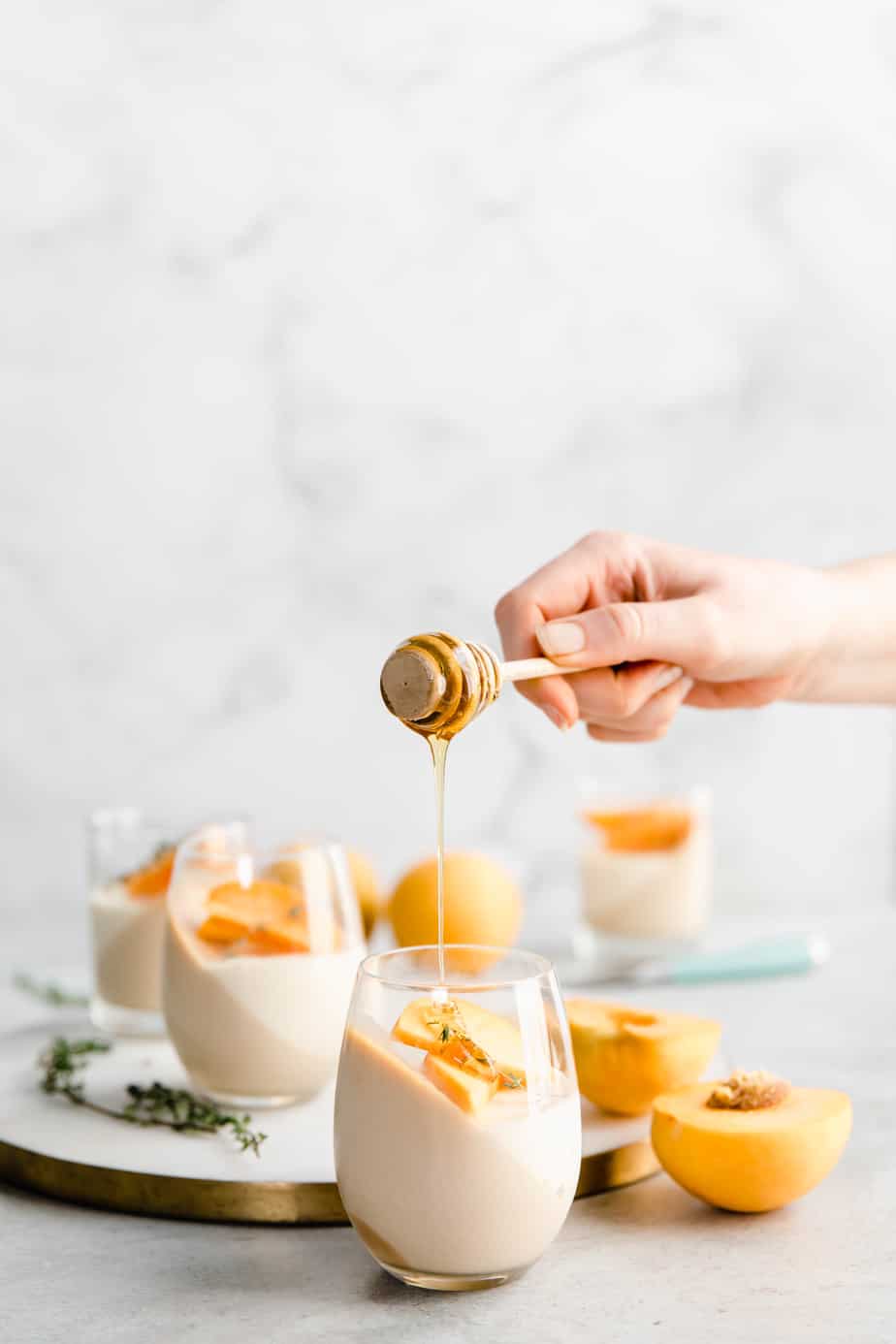 Rooibos & Vanilla Panna Cotta with peaches and thyme.