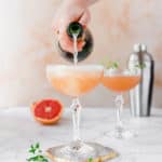 This easy to make Grapefruit Thyme Champagne Cocktail is the perfect cocktail recipe for every celebration. The combination of citrus, thyme and a little bubbly is always a winner!