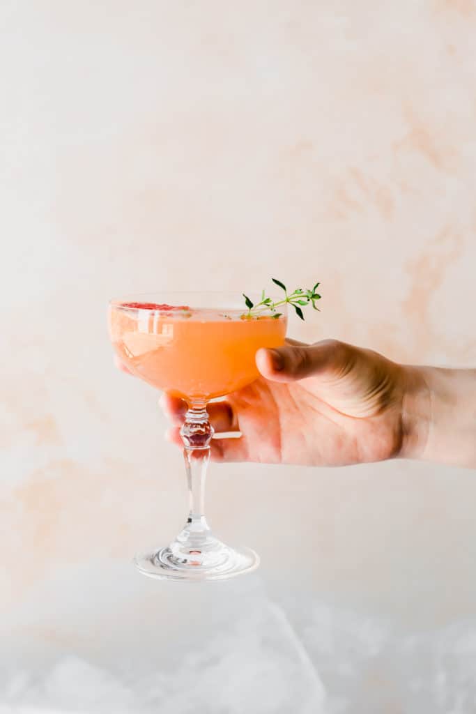 This easy to make Grapefruit Thyme Champagne Cocktail is the perfect cocktail recipe for every celebration. The combination of citrus, thyme and a little bubbly is always a winner!
