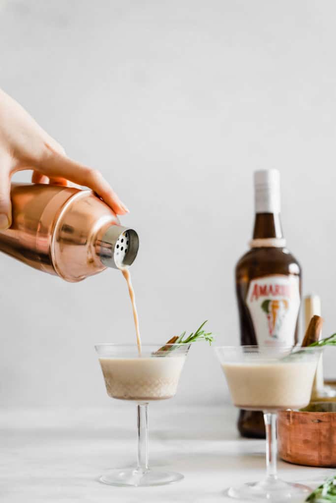 This easy Gingerbread Cocktail recipe is guaranteed to be your new favourite festive cocktail! Made with a homemade gingerbread syrup and cream liqueur, this easy holiday drink is decadent and full of festive flavors.