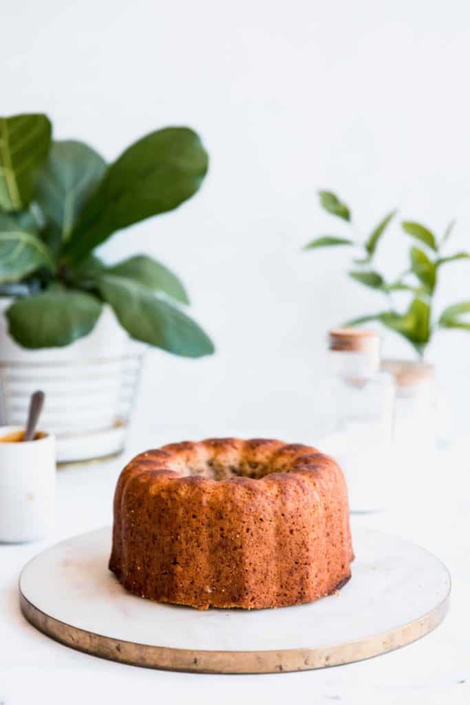 A delicious Caramel Bundt on a marble serving plate.