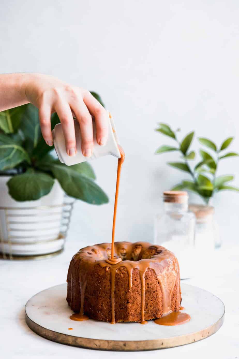 A delicious Butterscotch Caramel Cake coated with thick & creamy homemade butterscotch glaze.
