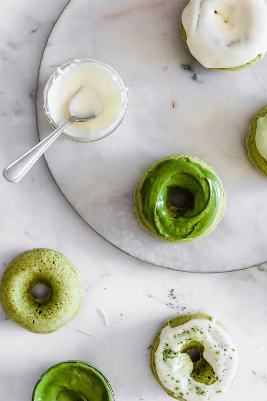 These easy Matcha Baked Donuts with Cream Cheese Glaze are perfectly soft, sweet, & simple to make. And let's not forget, they are also oh-so-pretty!