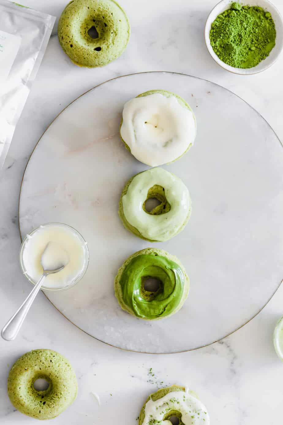 These easy Matcha Baked Donuts with Cream Cheese Glaze are perfectly soft, sweet, & simple to make. And let's not forget, they are also oh-so-pretty!
