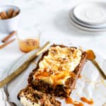 This easy Gluten-Free Apple Cinnamon Loaf Cake is deliciously moist and full of chunks of fresh apples and cozy cinnamon flavour. Pile on the dreamy cream cheese frosting and a drizzle of caramel and it is the perfect companion to a warm cup of tea or coffee.