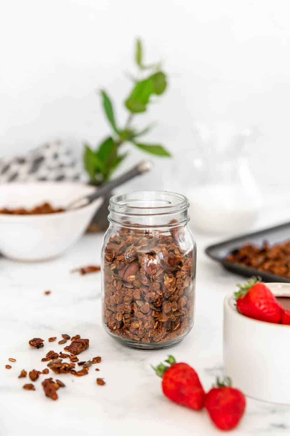 Banana bread granola stored in a mason jar.