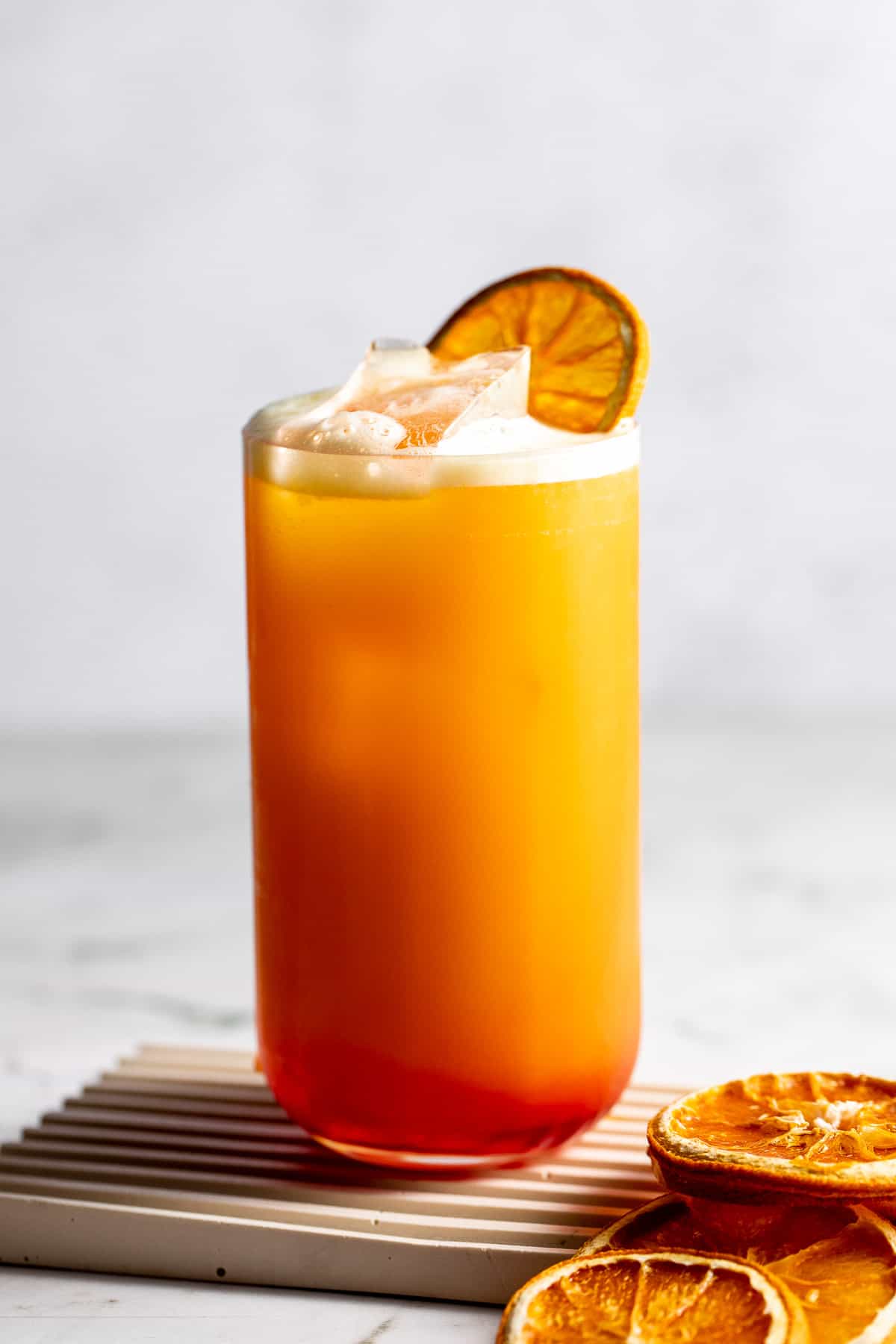 campari and orange juice cocktail in highball glass