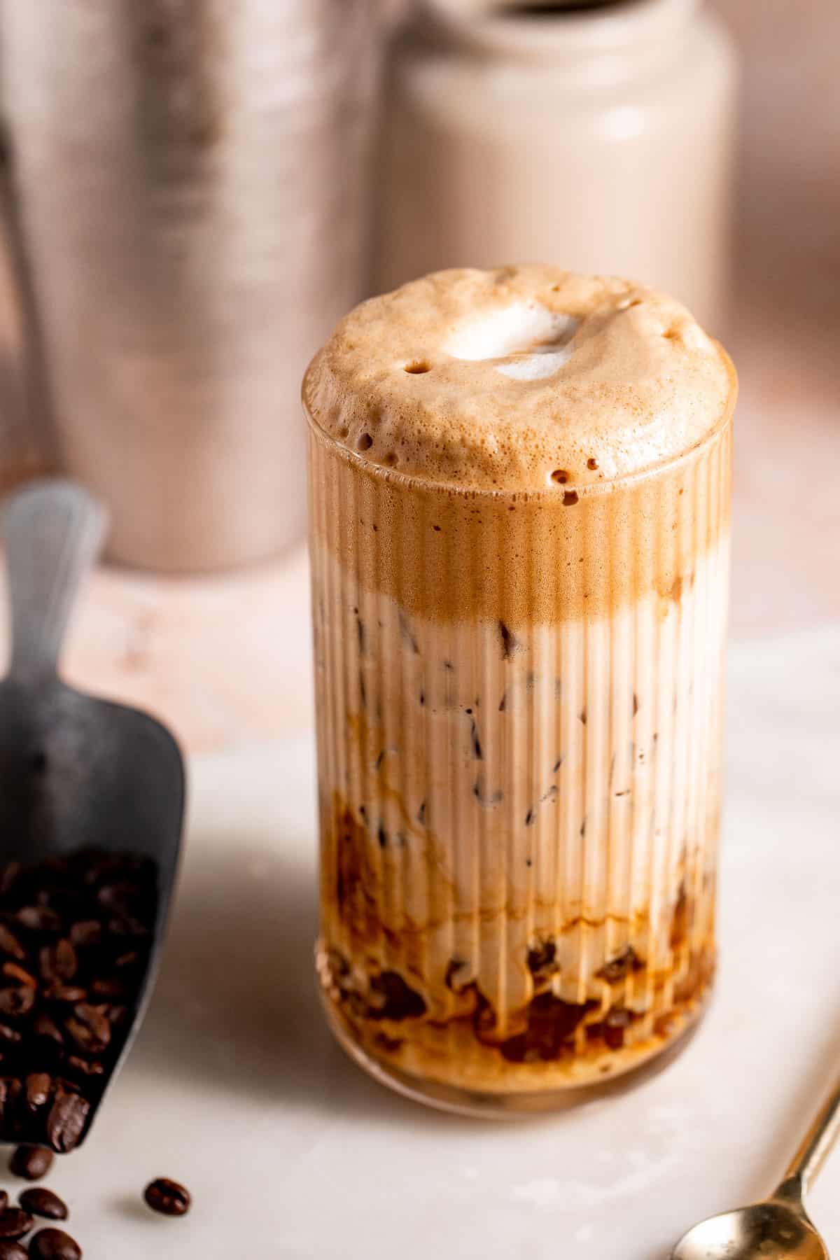 Peanut Butter Whiskey Cocktail served with ice in a tall glass.
