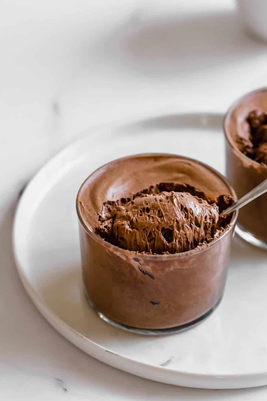 The Creamiest Chocolate Mousse with a spoon digging in.