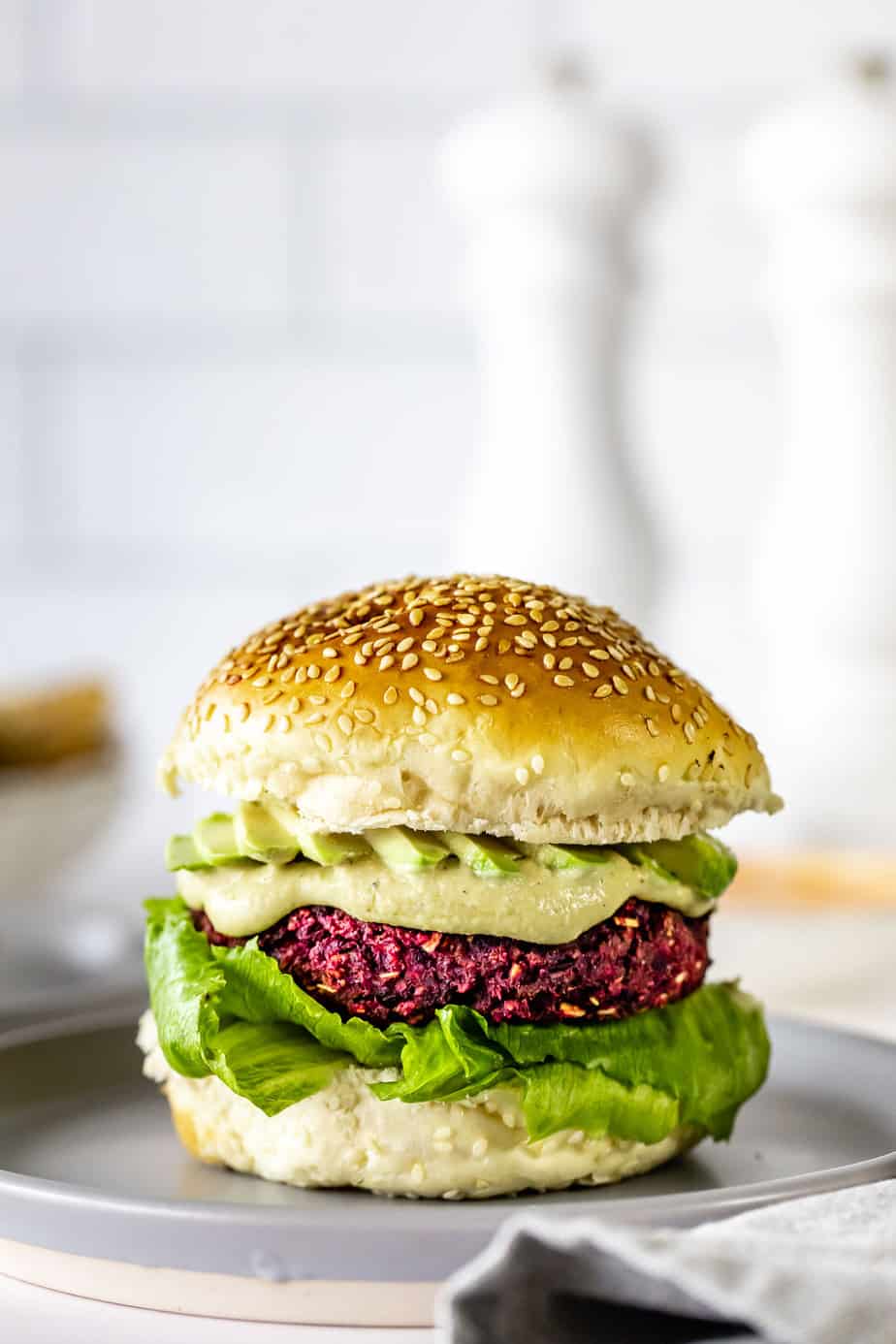 Vegan Beet Burger on a grey plate.