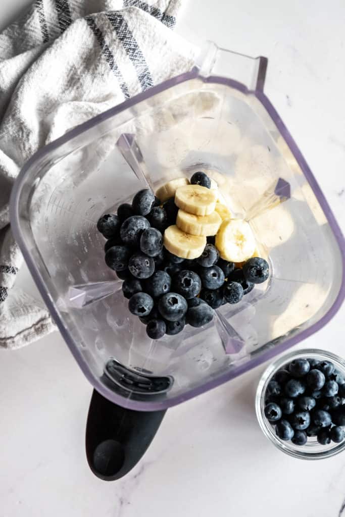 Blueberries and bananas in blender